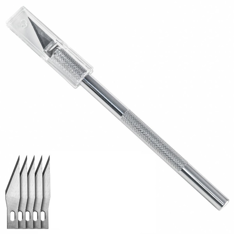 Scalpel métallique 6 lames. Scalpel métallique 6 lames.